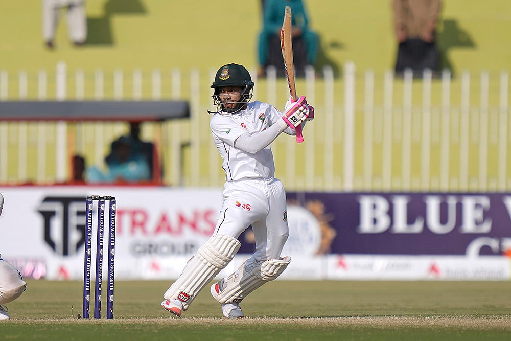 | Photo: AP/Anjum Naveed : Pakistan vs Bangladesh 1st Test, 3rd Day: Bangladesh's Mushfiqur Rahim follows the ball after playing a shot